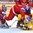 MONTREAL, CANADA - JANUARY 5: Russia's Yegor Voronkov #15 takes down Sweden's Joel Eriksson Ek #20 while Russia's Ilya Samsonov #30 looks on during bronze medal game action at the 2017 IIHF World Junior Championship. (Photo by Matt Zambonin/HHOF-IIHF Images)

